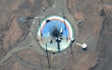 In this satellite photo from Maxar Technologies, trucks and other equipment surround a scorched launch pad at Iran's Imam Khomeini Spaceport in rural Semnan province on Feb. 27, 2022. (Satellite image ©2022 Maxar Technologies via AP)