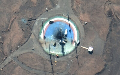 In this satellite photo from Maxar Technologies, trucks and other equipment surround a scorched launch pad at Iran's Imam Khomeini Spaceport in rural Semnan province on Feb. 27, 2022. (Satellite image ©2022 Maxar Technologies via AP) In this satellite photo from Maxar Technologies, trucks and other equipment surround a scorched launch pad at Iran's Imam Khomeini Spaceport in rural Semnan province on Feb. 27, 2022. (Satellite image ©2022 Maxar Technologies via AP)