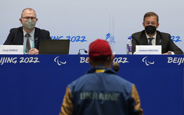 International Paralympic Committee (IPC) Chief Brand and Communications Officer Craig Spence, left, and President Andrew Parsons listen as a journalist from Ukraine asks a question during a press conference at the 2022 Winter Paralympics in Beijing, March 2, 2022. (AP Photo/Andy Wong) International Paralympic Committee (IPC) Chief Brand and Communications Officer Craig Spence, left, and President Andrew Parsons listen as a journalist from Ukraine asks a question during a press conference at the 2022 Winter Paralympics in Beijing, March 2, 2022. (AP Photo/Andy Wong)