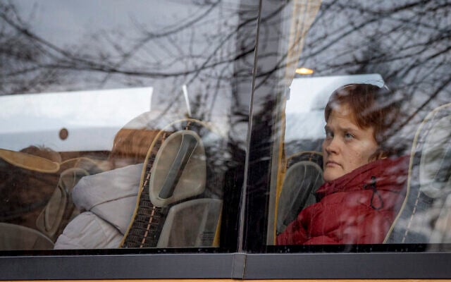 At the train station in the Hungarian town of Zahony, more than 200 Ukrainians with disabilities — residents of two care homes in Ukraine's capital of Kyiv — disembarked into the cold wind of the train platform after an arduous escape from the violence gripping Ukraine, March 2, 2022. (AP Photo/Balazs Kaufmann) At the train station in the Hungarian town of Zahony, more than 200 Ukrainians with disabilities — residents of two care homes in Ukraine's capital of Kyiv — disembarked into the cold wind of the train platform after an arduous escape from the violence gripping Ukraine, March 2, 2022. (AP Photo/Balazs Kaufmann)