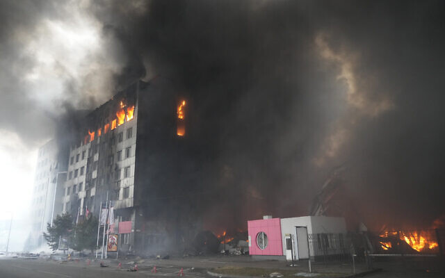 A building burns after shelling in Kyiv, Ukraine, Thursday, March 3, 2022. (AP Photo/Efrem Lukatsky)