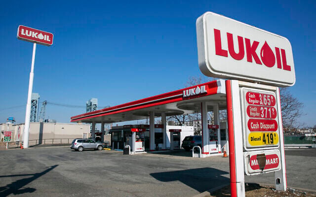 A worker pumps gas at a Lukoil station in Newark, New Jersey, on March 2, 2022. (AP/Ted Shaffrey) A worker pumps gas at a Lukoil station in Newark, New Jersey, on March 2, 2022. (AP/Ted Shaffrey)