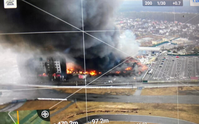 This 2022 aerial image provided by Ukrainian security forces, taken by a drone and shown on a screen, shows a blown-up building near the outskirts of Kyiv, Ukraine. The exact date and time of the image are unknown. (Ukrainian Security Forces via AP) This 2022 aerial image provided by Ukrainian security forces, taken by a drone and shown on a screen, shows a blown-up building near the outskirts of Kyiv, Ukraine. The exact date and time of the image are unknown. (Ukrainian Security Forces via AP)