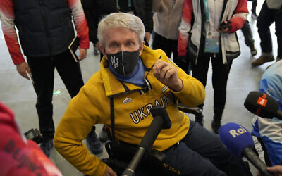 President of Ukraine's National Paralympic Committee Valerii Sushkevych speaks to the media at the 2022 Winter Paralympics, on Thursday, March 3, 2022, in Beijing. (AP Photo/Dita Alangkara)