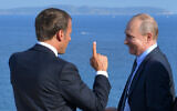 French President Emmanuel Macron, left, talks with Russian President Vladimir Putin during their meeting at the fort of Bregancon in Bormes-les-Mimosas, southern France, on August 19, 2019. (Alexei Druzhinin, Sputnik, Kremlin Pool Photo via AP)