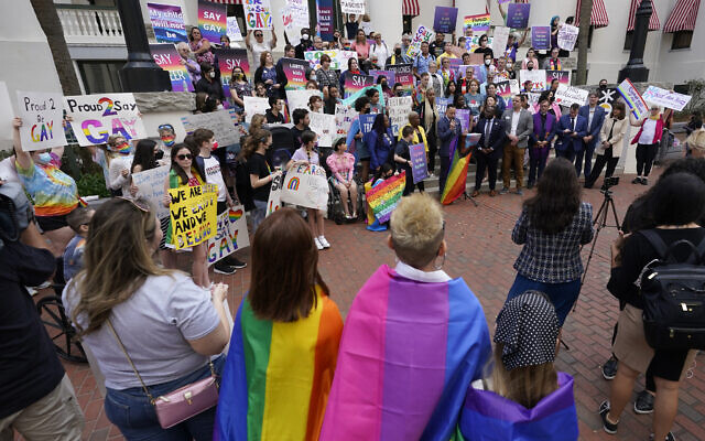 Demonstrators gather on the steps of the Florida Historic Capitol Museum in front of the Florida State Capitol, on Monday, March 7, 2022, in Tallahassee, FL. (AP Photo/Wilfredo Lee) Demonstrators gather on the steps of the Florida Historic Capitol Museum in front of the Florida State Capitol, on Monday, March 7, 2022, in Tallahassee, FL. (AP Photo/Wilfredo Lee)