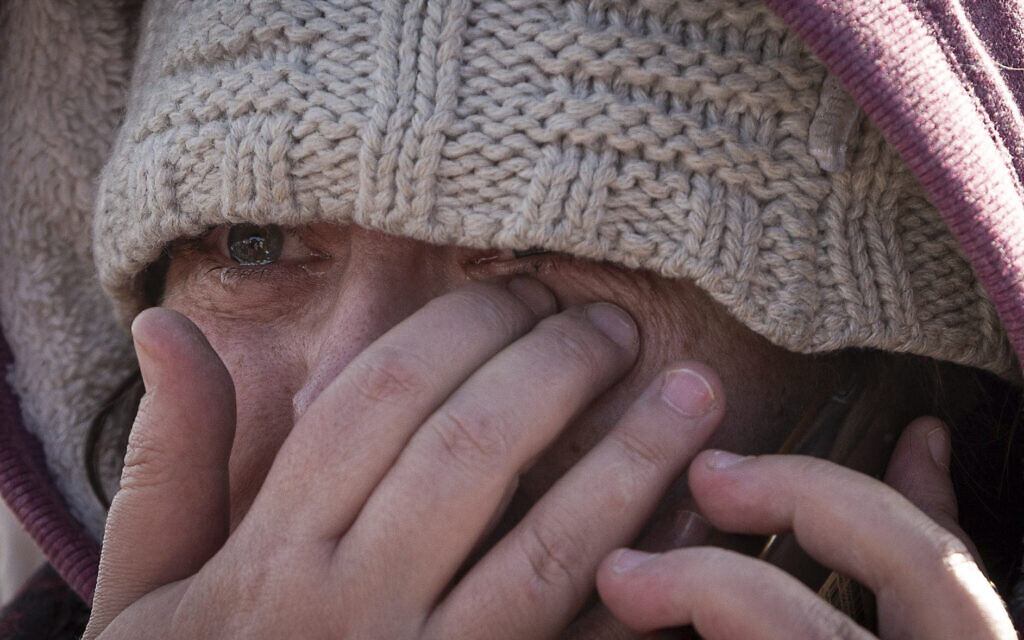 Masha Fesenko, from Kyiv, arrives at the border crossing in Medyka, Poland, Poland, March 8, 2022 (AP Photo/Visar Kryeziu)