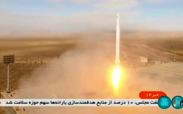This image taken from video footage aired by Iranian state television on March 8, 2022, shows the launch of a rocket by Iran's Revolutionary Guard carrying a Noor-2 satellite in northeastern Shahroud Desert, Iran. (Iranian state television via AP) This image taken from video footage aired by Iranian state television on March 8, 2022, shows the launch of a rocket by Iran's Revolutionary Guard carrying a Noor-2 satellite in northeastern Shahroud Desert, Iran. (Iranian state television via AP)