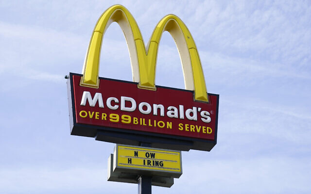 A sign is displayed outside a McDonald's restaurant in Des Moines, Iowa, April 27, 2021. (AP Photo/Charlie Neibergall, File)