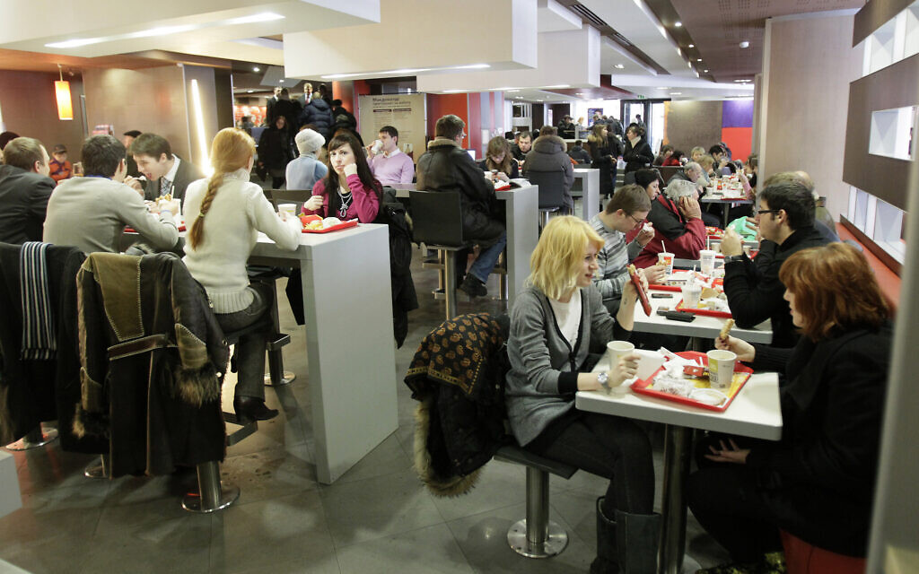 File: People are seen in a McDonald's restaurant at Moscow's Pushkin Square, on February 1, 2010. (AP Photo/Ivan Sekretarev, file)