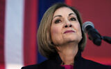 Iowa Gov. Kim Reynolds speaks during a rally, Wednesday, March 9, 2022, in Des Moines, Iowa.  (AP Photo/Charlie Neibergall)