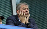 Chelsea soccer club owner Roman Abramovich sits in his box before their English Premier League soccer match against Sunderland at Stamford Bridge stadium in London, December 19, 2015. (AP/Matt Dunham)