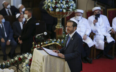 President Isaac Herzog talks during a ceremony at Neve Shalom synagogue, in Istanbul, Turkey, March 10, 2022. (Emrah Gurel/AP)