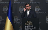 Ukraine's Foreign Minister Dmytro Kuleba listens to journalists during a news conference, in Antalya, Turkey, March 10, 2022. (AP Photo)