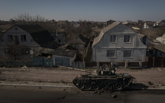 A destroyed tank is seen after battles between Ukrainian and Russian forces on a main road near Brovary, north of Kyiv, Ukraine, March 10, 2022. (AP Photo/Felipe Dana) A destroyed tank is seen after battles between Ukrainian and Russian forces on a main road near Brovary, north of Kyiv, Ukraine, March 10, 2022. (AP Photo/Felipe Dana)