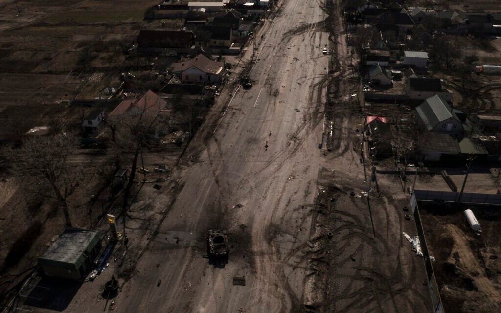 Destroyed Russian tanks are seen on a main road after battles near Brovary, north of Kyiv, Ukraine, March 10, 2022. (AP Photo/Felipe Dana)