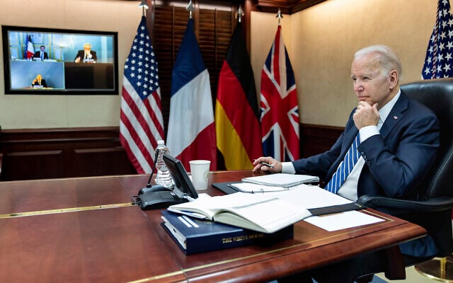 In this image provided by the White House, US President Joe Biden listens during a secure video call with French President Emmanuel Macron, German Chancellor Olaf Scholz and British Prime Minister Boris Johnson in the Situation Room at the White House, March 7, 2022, in Washington. (Adam Schultz/The White House via AP, File) In this image provided by the White House, US President Joe Biden listens during a secure video call with French President Emmanuel Macron, German Chancellor Olaf Scholz and British Prime Minister Boris Johnson in the Situation Room at the White House, March 7, 2022, in Washington. (Adam Schultz/The White House via AP, File)