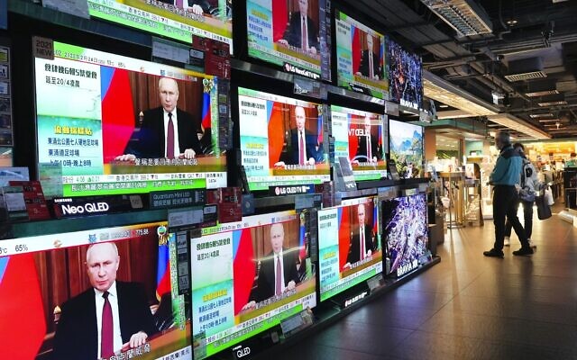 People stand by TV screens broadcasting the news of Russian troops that have launched their attack on Ukraine, in Hong Kong Thursday, Feb. 24, 2022. (AP/Vincent Yu) People stand by TV screens broadcasting the news of Russian troops that have launched their attack on Ukraine, in Hong Kong Thursday, Feb. 24, 2022. (AP/Vincent Yu)