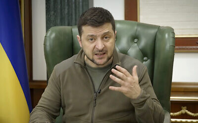 In this image from video provided by the Ukrainian Presidential Press Office and posted on Facebook, on March 12, 2022, Ukrainian President Volodymyr Zelensky speaks in Kyiv, Ukraine. (Ukrainian Presidential Press Office via AP)