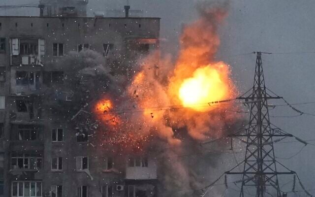 An explosion in an apartment building that came under fire from a Russian army tank in Mariupol, Ukraine, on Friday, March 11, 2022. (AP Photo/Evgeniy Maloletka) An explosion in an apartment building that came under fire from a Russian army tank in Mariupol, Ukraine, on Friday, March 11, 2022. (AP Photo/Evgeniy Maloletka)