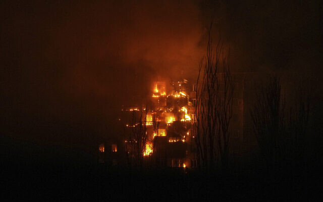 A fire burns at an apartment building after it was hit by the shelling of a residential district in Mariupol, Ukraine, March 11, 2022. (AP Photo/Evgeniy Maloletka) A fire burns at an apartment building after it was hit by the shelling of a residential district in Mariupol, Ukraine, March 11, 2022. (AP Photo/Evgeniy Maloletka)