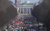 People attend a pro-Ukraine protest rally in Berlin, Germany, March 13, 2022. (AP Photo/Michael Sohn)
