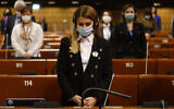 Members of the Parliamentary Assembly of the Council of Europe (PACE) hold a minute of silence for victims of the war in Ukraine, March 14, 2022, in Strasbourg, eastern France. (Jean-Francois Badias/AP)