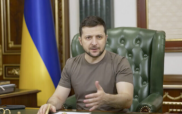 In this image from video provided by the Ukrainian Presidential Press Office and posted on Facebook early Tuesday, March 15, 2022, Ukrainian President Volodymyr Zelensky speaks in Kyiv, Ukraine. (Ukrainian Presidential Press Office via AP)