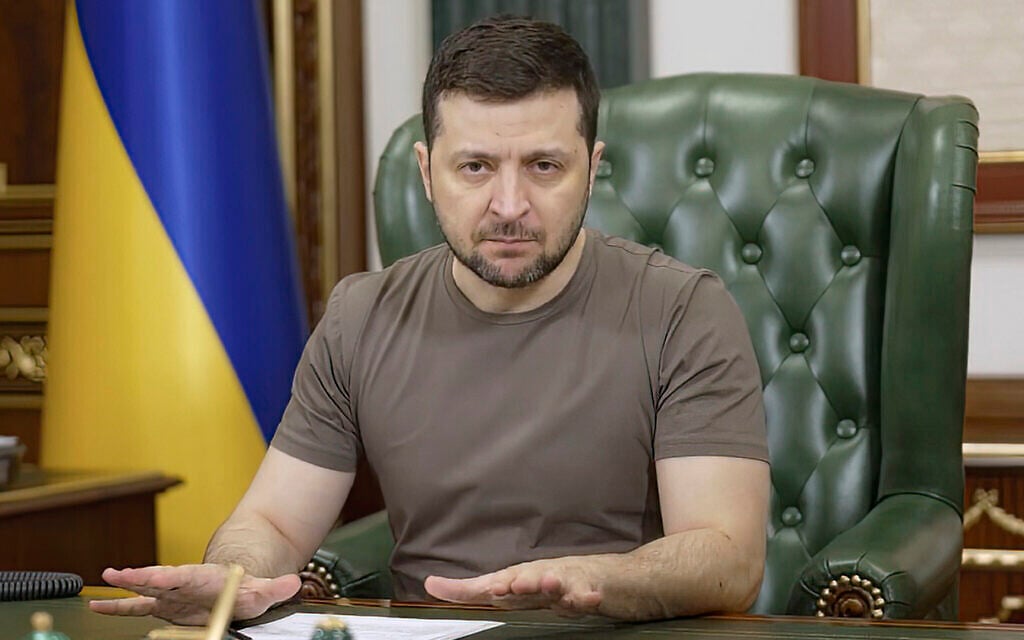 In this image from video provided by the Ukrainian Presidential Press Office and posted on Facebook early Tuesday, March 15, 2022, Ukrainian President Volodymyr Zelensky speaks in Kyiv, Ukraine. (Ukrainian Presidential Press Office via AP)