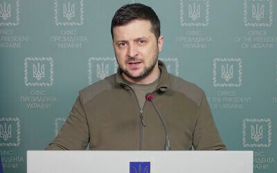 In this image from video provided by the Ukrainian Presidential Press Office and posted to Facebook on March 15, 2022, Ukrainian President Volodymyr Zelensky speaks in Kyiv, Ukraine. (Ukrainian Presidential Press Office via AP)