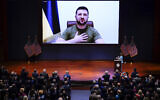 Speaker of the US House Nancy Pelosi introduces Ukrainian President Volodymyr Zelensky by video at the Capitol in Washington, March 16, 2022. (AP Photo/J. Scott Applewhite, Pool)