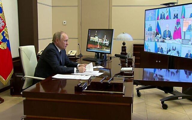 Russian President Vladimir Putin holds a video conference, March 16, 2022, at the Novo-Ogaryovo residence, outside Moscow. (Russian Presidential Press Service via AP) Russian President Vladimir Putin holds a video conference, March 16, 2022, at the Novo-Ogaryovo residence, outside Moscow. (Russian Presidential Press Service via AP)