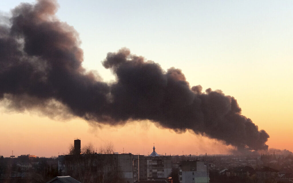 A cloud of smoke rises after an explosion in Lviv, western Ukraine, March 18, 2022. (AP Photo, File)