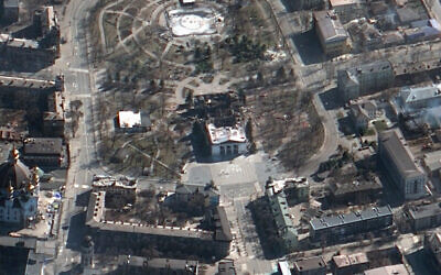 This satellite image provided by Maxar Technologies on March 19, 2022, shows the aftermath of the airstrike on the Mariupol Drama theater, Ukraine, and the area around it. (Satellite image ©2022 Maxar Technologies via AP) This satellite image provided by Maxar Technologies on March 19, 2022, shows the aftermath of the airstrike on the Mariupol Drama theater, Ukraine, and the area around it. (Satellite image ©2022 Maxar Technologies via AP)
