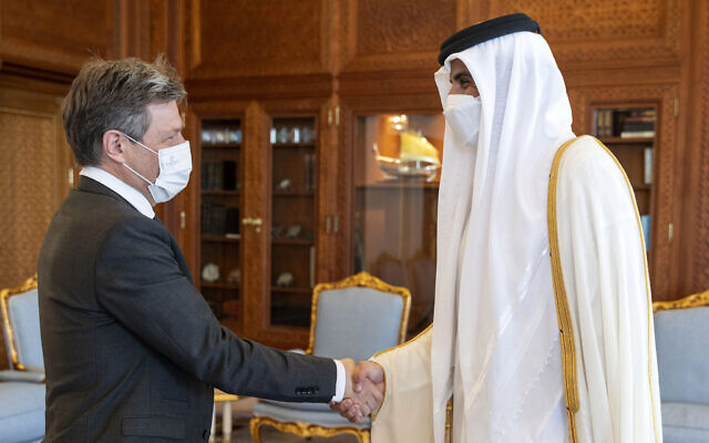 German Economy and Climate Minister and Vice Chancellor Robert Habeck, left, shakes hands with the Emir of Qatar Sheikh Tamim bin Hamad Al Thani, in Doha, Qatar, March 20, 2022. (Amiri Diwan via AP) German Economy and Climate Minister and Vice Chancellor Robert Habeck, left, shakes hands with the Emir of Qatar Sheikh Tamim bin Hamad Al Thani, in Doha, Qatar, March 20, 2022. (Amiri Diwan via AP)