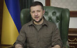 In this image from video provided by the Ukrainian Presidential Press Office, Ukrainian President Volodymyr Zelensky speaks from Kyiv, Ukraine, on March 21, 2022. (Ukrainian Presidential Press Office via AP)