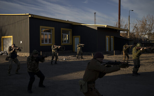Civilian volunteers attend a training camp of the Ukrainian Territorial Defense Forces in Brovary, northeast of Kyiv, Ukraine, March 21, 2022. (AP Photo/Felipe Dana) Civilian volunteers attend a training camp of the Ukrainian Territorial Defense Forces in Brovary, northeast of Kyiv, Ukraine, March 21, 2022. (AP Photo/Felipe Dana)