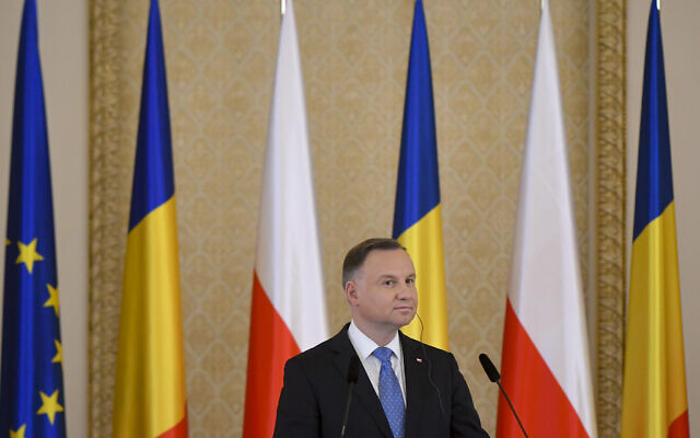 Poland's President Andrzej Duda listens to Romania's President Klaus Iohannis during press statements at the Presidential Palace in Bucharest, Romania, March 22, 2022. (AP Photo/Andreea Alexandru) Poland's President Andrzej Duda listens to Romania's President Klaus Iohannis during press statements at the Presidential Palace in Bucharest, Romania, March 22, 2022. (AP Photo/Andreea Alexandru)