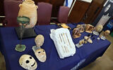 Looted antiquities worth $5-million, seized from billionaire hedge fund manager Michael Steinhardt, are displayed in the offices of the Manhattan District Attorney, in New York, March 22, 2022. (Richard Drew/AP)