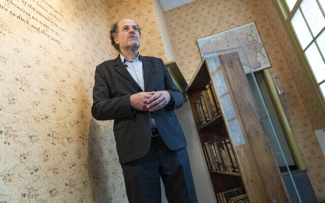 Ronald Leopold, executive director Anne Frank House, answers questions next to the passage to the secret annex during an interview in Amsterdam, Netherlands, Monday, Jan. 17, 2022. (AP Photo/Peter Dejong, File) Ronald Leopold, executive director Anne Frank House, answers questions next to the passage to the secret annex during an interview in Amsterdam, Netherlands, Monday, Jan. 17, 2022. (AP Photo/Peter Dejong, File)