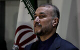 Iran's Foreign Minister Hossein Amir-Abdollahian, speaks during a joint press conference with his Lebanese counterpart Abdallah Bouhabib in Beirut, Lebanon, on March 24, 2022. (AP Photo/Bilal Hussein)