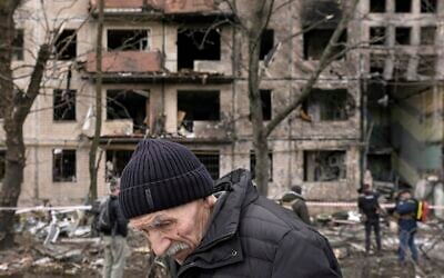 An elderly man walks outside an apartment block which was destroyed by an artillery strike in Kyiv, Ukraine, March 14, 2022. (AP Photo/Vadim Ghirda) An elderly man walks outside an apartment block which was destroyed by an artillery strike in Kyiv, Ukraine, March 14, 2022. (AP Photo/Vadim Ghirda)