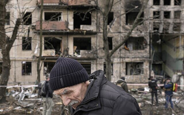 An elderly man walks outside an apartment block which was destroyed by an artillery strike in Kyiv, Ukraine, March 14, 2022. (AP Photo/Vadim Ghirda) An elderly man walks outside an apartment block which was destroyed by an artillery strike in Kyiv, Ukraine, March 14, 2022. (AP Photo/Vadim Ghirda)