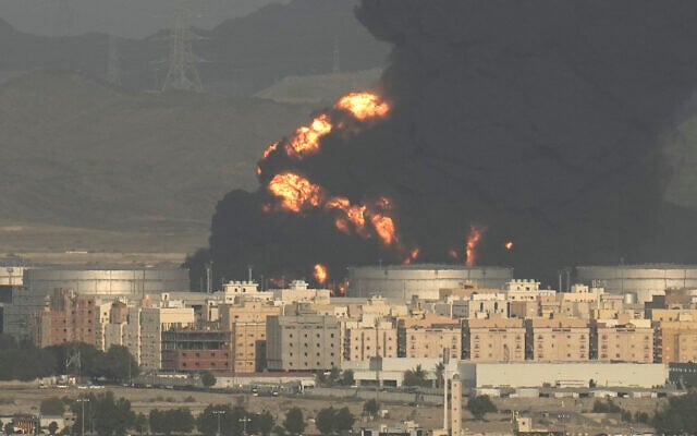 A cloud of smoke rises from a burning oil depot in Jiddah, Saudi Arabia, Friday, March 25, 2022. (AP Photo/Hassan Ammar) A cloud of smoke rises from a burning oil depot in Jiddah, Saudi Arabia, Friday, March 25, 2022. (AP Photo/Hassan Ammar)