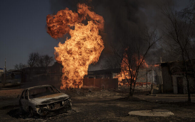 Flames and smoke rise from a fire following a Russian attack in Kharkiv, Ukraine, March 25, 2022. (AP Photo/Felipe Dana) Flames and smoke rise from a fire following a Russian attack in Kharkiv, Ukraine, March 25, 2022. (AP Photo/Felipe Dana)