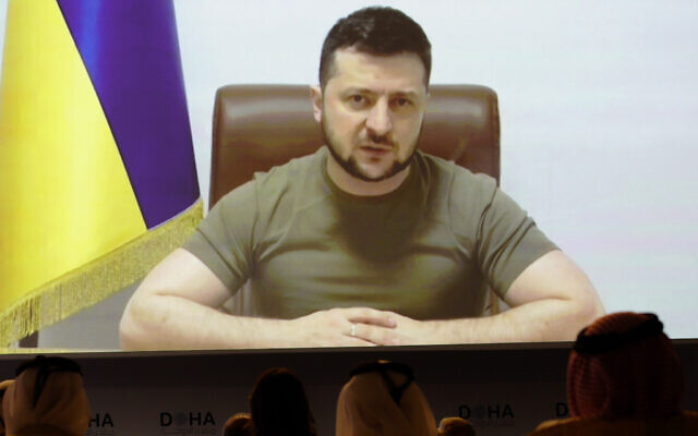 Ukrainian President Volodymyr Zelensky speaks via video call to the Doha Forum in Doha, Qatar, Saturday, March 26, 2022. Ukraine's president made a surprise video appearance Saturday at Qatar's Doha Forum, calling on the energy-rich nation and others to boost their production to counteract the loss of Russian energy supplies. (AP Photo/Lujain Jo) Ukrainian President Volodymyr Zelensky speaks via video call to the Doha Forum in Doha, Qatar, Saturday, March 26, 2022. Ukraine's president made a surprise video appearance Saturday at Qatar's Doha Forum, calling on the energy-rich nation and others to boost their production to counteract the loss of Russian energy supplies. (AP Photo/Lujain Jo)