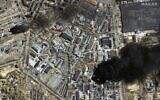 This satellite image provided by Maxar Technologies shows an overview of burning oil storage tanks and an industrial area in Chernihiv, Ukraine during the Russian invasion, on Monday, March 21, 2022 (Satellite image ©2022 Maxar Technologies via AP, File)