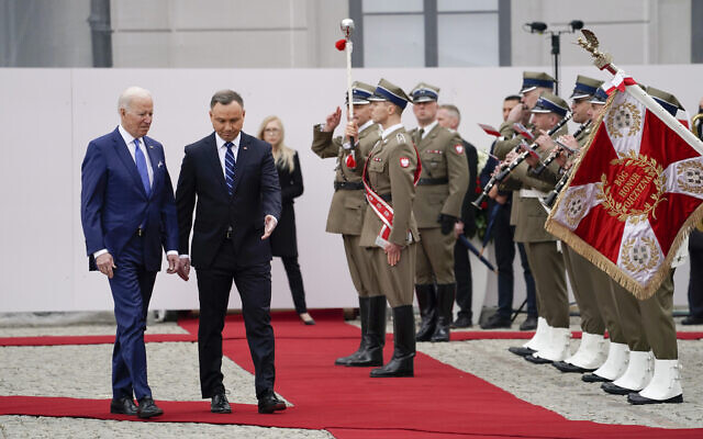 US President Joe Biden participates in an arrival ceremony with Polish President Andrzej Duda at the Presidential Palace, on Saturday, March 26, 2022, in Warsaw. (AP/Evan Vucci) US President Joe Biden participates in an arrival ceremony with Polish President Andrzej Duda at the Presidential Palace, on Saturday, March 26, 2022, in Warsaw. (AP/Evan Vucci)