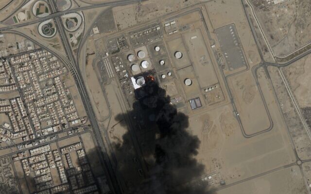 This satellite photo from Planet Labs PBC shows a fire still burning at Saudi Aramco's North Jiddah Bulk Plant after an attack by Yemen's Houthi rebels ahead of a Formula One race in Jeddah, Saudi Arabia, on March 26, 2022. (Planet Labs PBC via AP) This satellite photo from Planet Labs PBC shows a fire still burning at Saudi Aramco's North Jiddah Bulk Plant after an attack by Yemen's Houthi rebels ahead of a Formula One race in Jeddah, Saudi Arabia, on March 26, 2022. (Planet Labs PBC via AP)