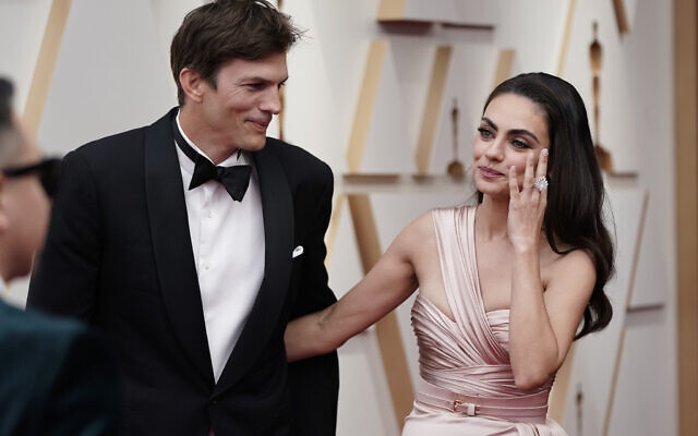 Ashton Kutcher, left, and Mila Kunis arrive at the Oscars on Sunday, March 27, 2022, at the Dolby Theatre in Los Angeles. (AP Photo/Jae C. Hong) Ashton Kutcher, left, and Mila Kunis arrive at the Oscars on Sunday, March 27, 2022, at the Dolby Theatre in Los Angeles. (AP Photo/Jae C. Hong)
